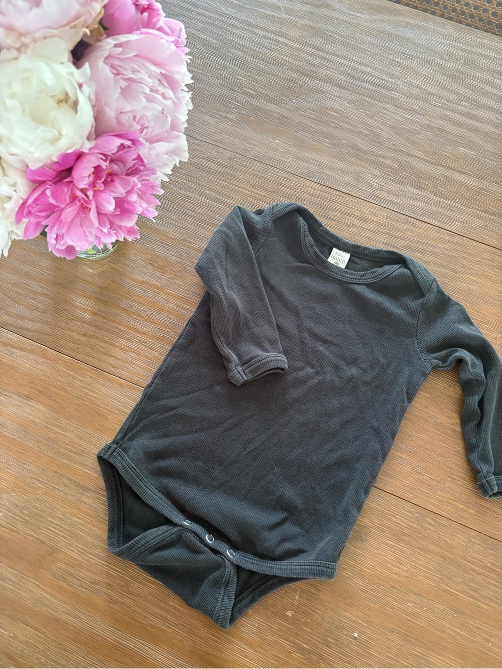 Kate Quinn Long-Sleeve Black Baby Bodysuit